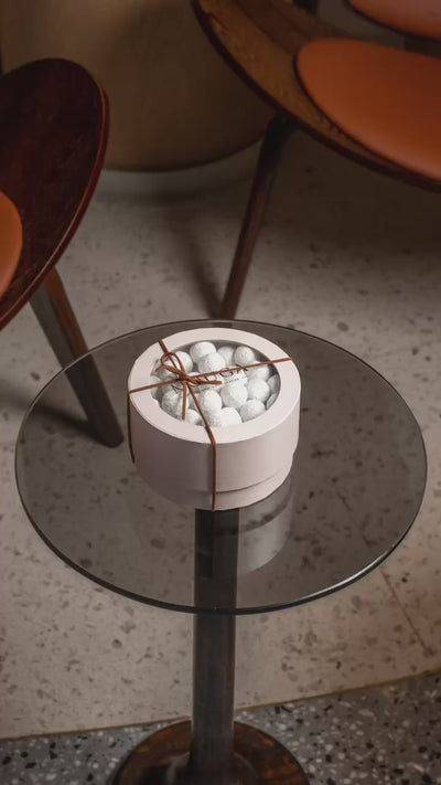 Nouga circle boxes stop motion with chocolate truffle and caramel truffle